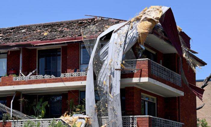 Structural damage caused by storms is seen on a unit complex on Boronia Street, in Dee Why, north-east of Sydney, on Dec. 20, 2021. (AAP Image/Bianca De Marchi) 