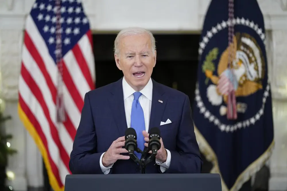 President Joe Biden speaks about the COVID-19 response and vaccinations, Tuesday, Dec. 21, 2021, in the State Dining Room of the White House in Washington. (AP Photo/Patrick Semansky)