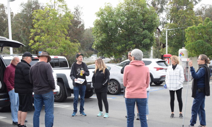 Family and friends of Scott Karsten, 60, who went missing in October, organized a search-and-rescue party in San Clemente, Calif., on Dec. 21, 2021. (Brandon Drey/The Epoch Times)