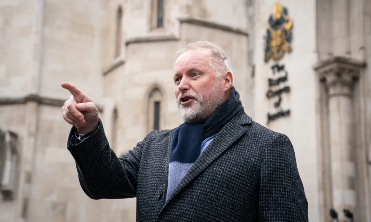 Former police officer Harry Miller speaks to the media outside the Royal Courts of Justice in London on Dec. 20, 2021. (Dominic Lipinski
/PA)