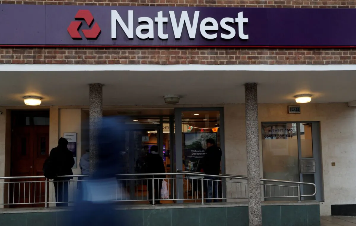 The logo of NatWest Bank, part of the Royal Bank of Scotland group is seen outside a branch in Enfield, London Britain on Nov. 15, 2017. (John Sibley/Reuters)