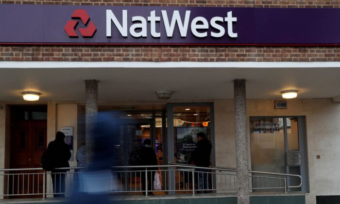 The logo of NatWest Bank, part of the Royal Bank of Scotland group is seen outside a branch in Enfield, London Britain on Nov. 15, 2017. (John Sibley/Reuters)