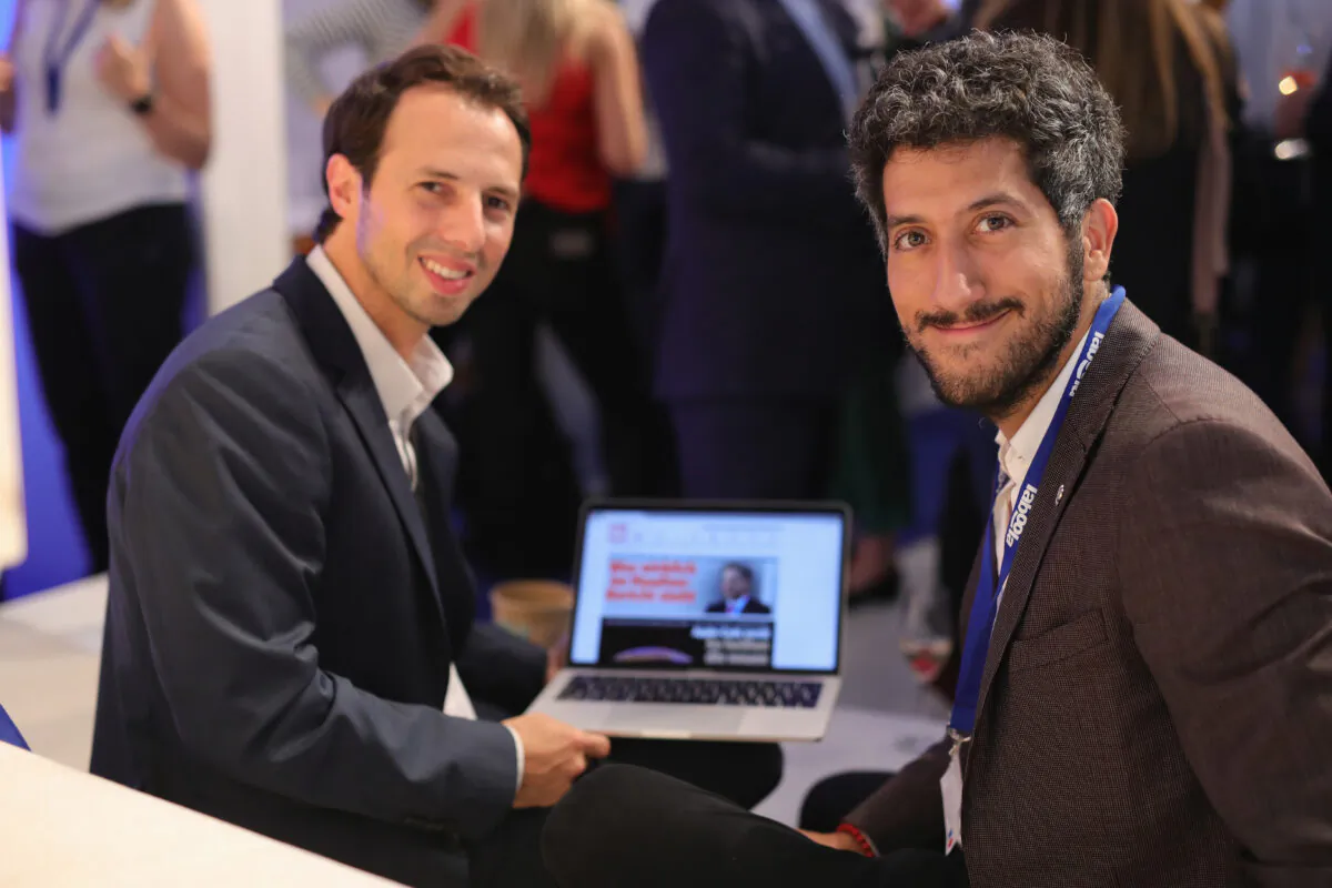 A photo showing from left to right, Stefan Betzold, Managing Director Digital Bild Group and Taboola founder and chief executive Adam Singolda, at the Digital Marketing Expo & Conference 2018 DMEXCO, in Cologne, Germany, on Sept. 12, 2018. (Andreas Rentz/Getty Images for Taboola)