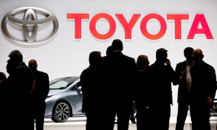 A Toyota logo is displayed at the 89th Geneva International Motor Show in Geneva, Switzerland, on Mar. 5, 2019. (Pierre Albouy/Reuters)