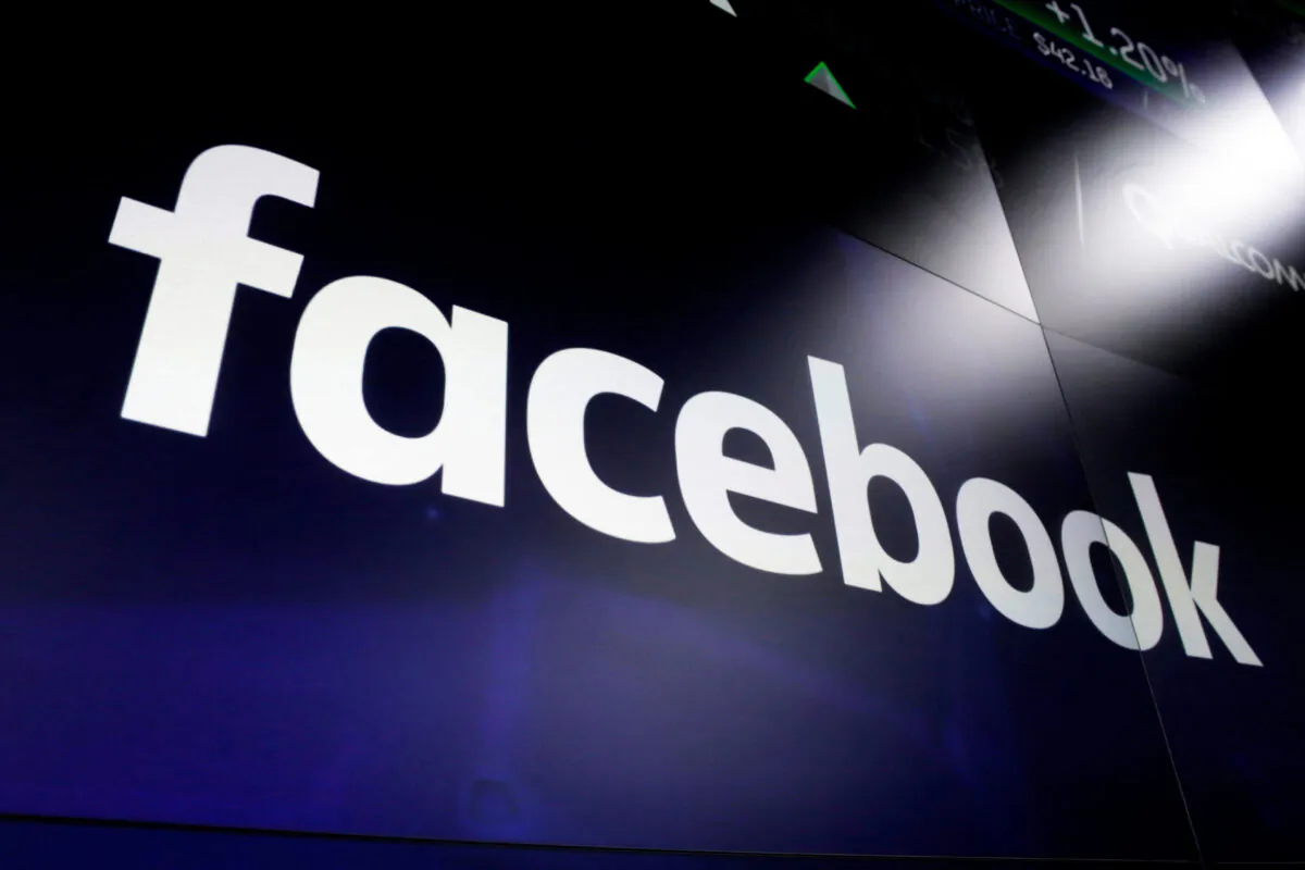 Facebook logo at the Nasdaq MarketSite in New York's Times Square on March 29, 2018. (The Canadian Press/AP-Richard Drew)