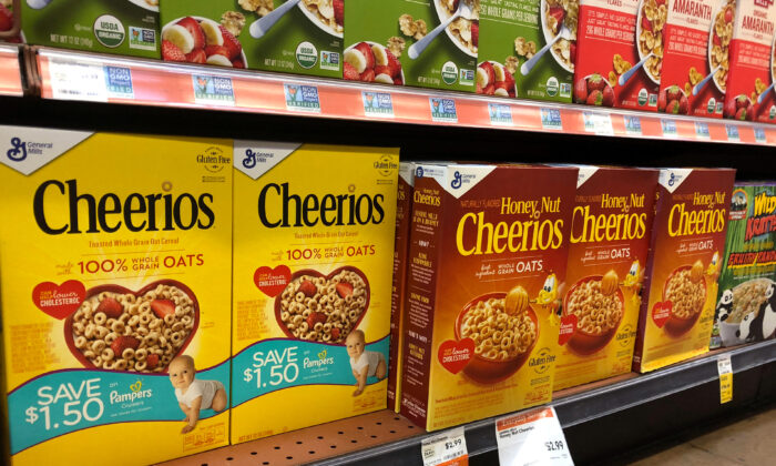 General Mills Inc.'s Cheerios and Honey Nut Cheerios are displayed on the shelf of a Whole Foods Market store in Venice, Calif., on March 17, 2018. (Lisa Baertlein/Reuters)