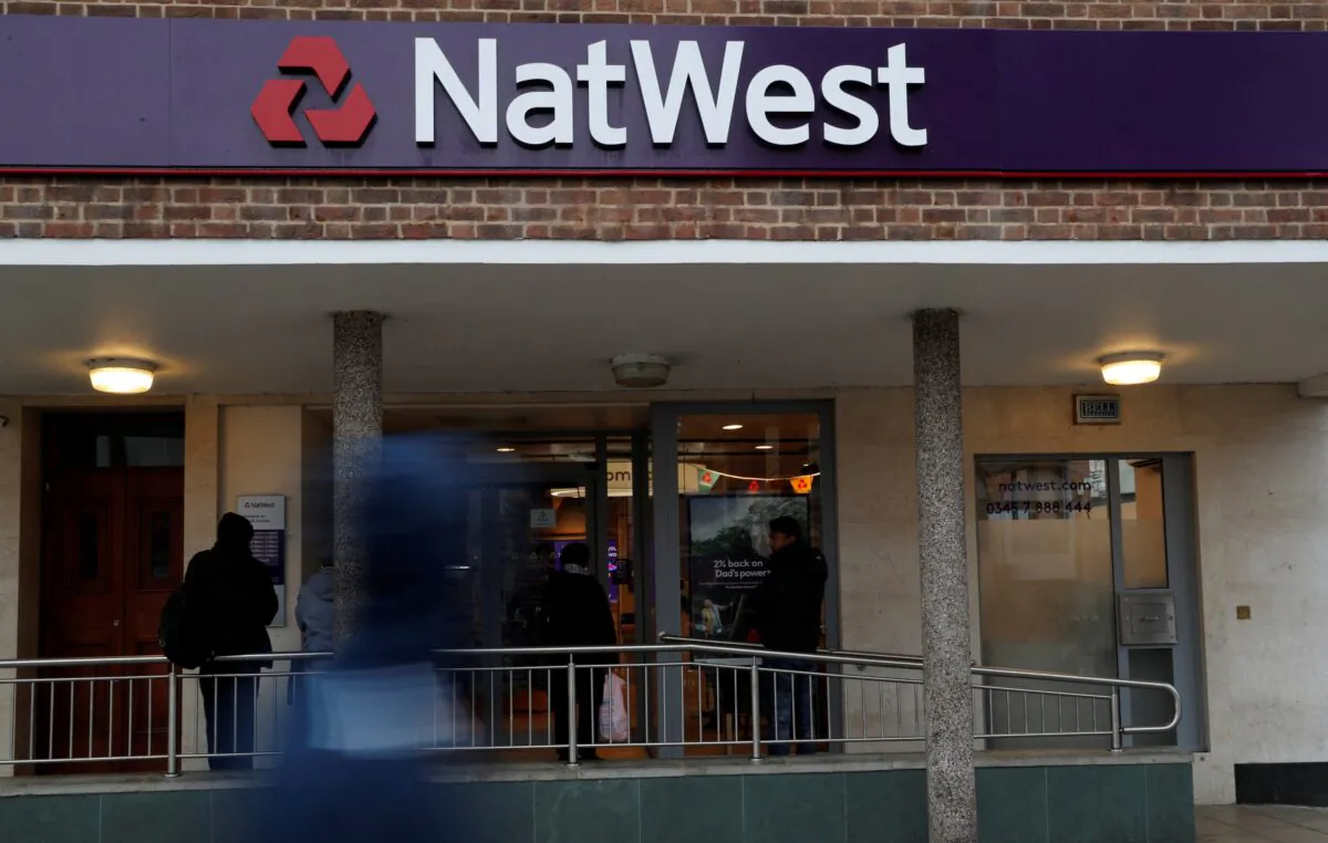 The logo of NatWest Bank, part of the Royal Bank of Scotland group, is seen outside a branch in Enfield, London, on Nov. 15, 2017. (John Sibley/Reuters)