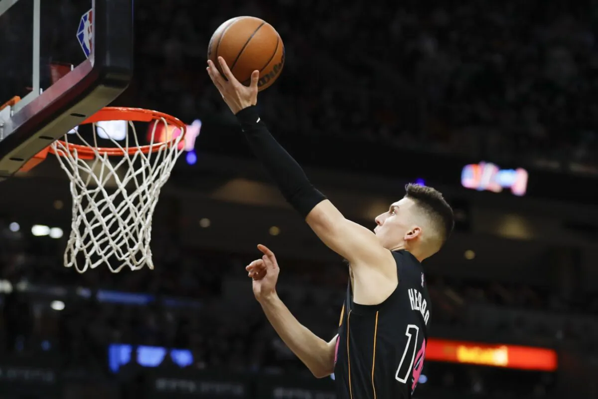 Miami Heat guard Tyler Herro (14) attempts a layup shot against the Indiana Pacers, during an NBA game at FTX Arena, in Miami, Fla., on Dec. 21, 2021. (Sam Navarro/USA TODAY Sports via Field Level Media)
