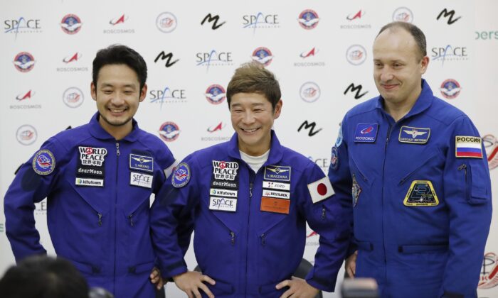 Roscosmos cosmonaut Alexander Misurkin (R), space flight participants Yusaku Maezawa (C), and Yozo Hirano attend a news conference ahead of the expedition to the International Space Station at the Gagarin Cosmonauts' Training Center, in Star City outside Moscow, on Oct. 14, 2021. (Shamil Zhumatov/Pool Photo via AP)