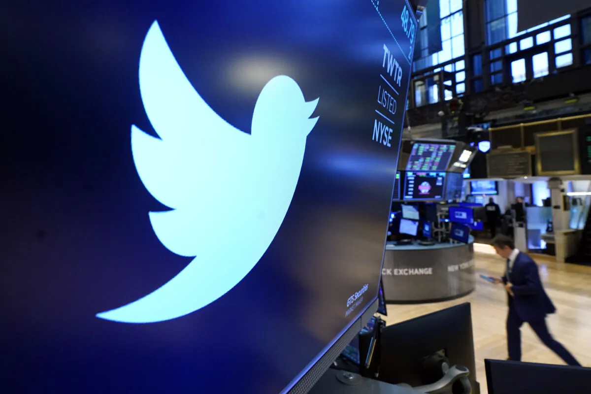The logo for Twitter appears above a trading post on the floor of the New York Stock Exchange on Nov. 29, 2021. (Richard Drew/AP Photo)