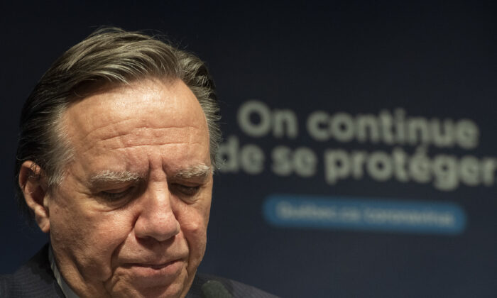 Quebec Premier Francois Legault speaks during a news conference in Montreal, on Dec. 22, 2021, where he gave an update on the ongoing COVID-19 pandemic. (The Canadian Press/Graham Hughes)