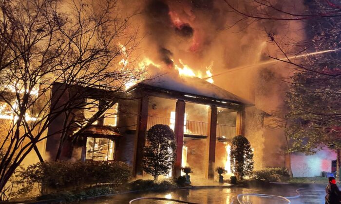 Firefighters respond to a fire in McLean, Va., on Dec. 22, 2021. (Fairfax County Fire and Rescue Department via AP)