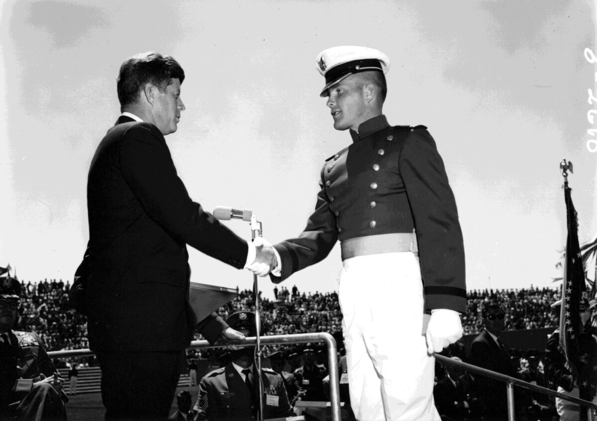 Cadet Tom Fryer shakes hands with President John F. Kennedy at the U.S. Air Force Academy graduation in 1963. (Courtesy of Wes Fryer)