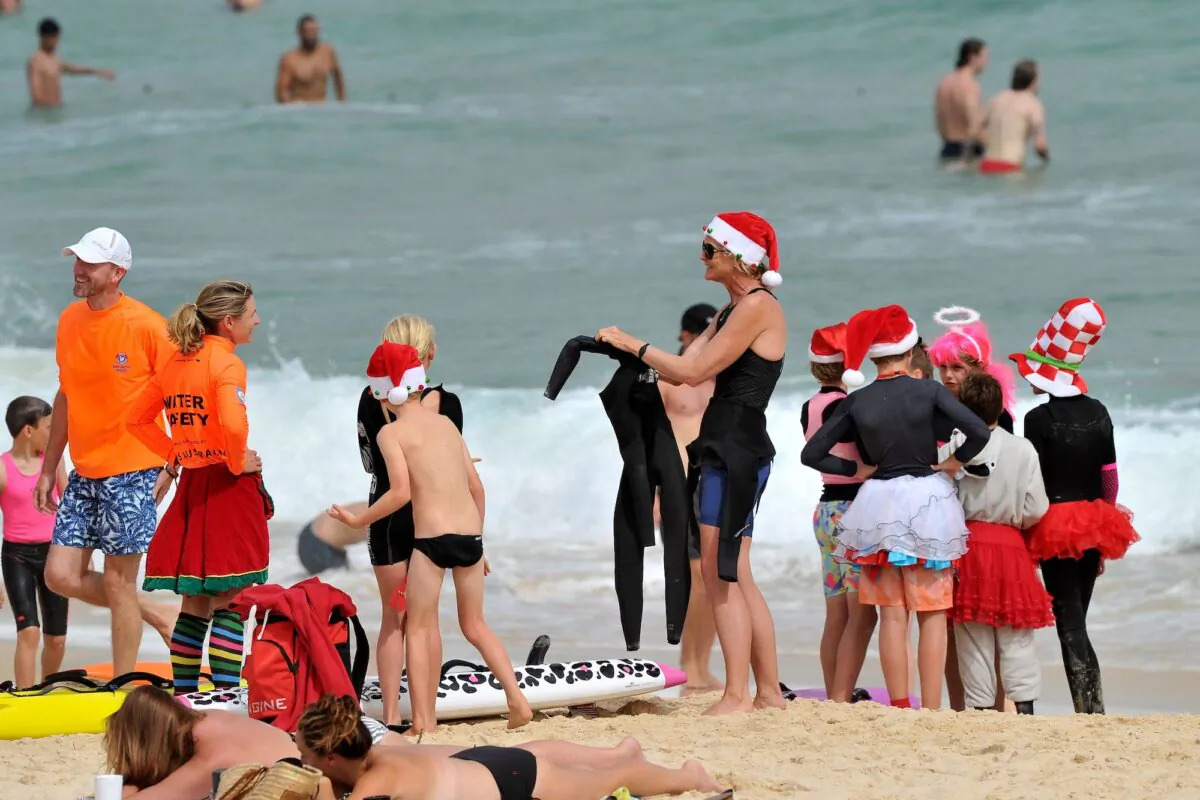 Residents enjoy their afternoon on the Bondi Beach in Sydney, Australia, on Dec. 22, 2021. (Mohammad Farooq / AFP via Getty Images)