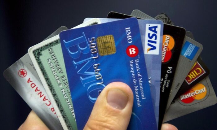 The Liberals promised in the spring budget to run a consultation on a proposal to lower the fees merchants pay every time a shopper pays with a credit card. (The Canadian Press)