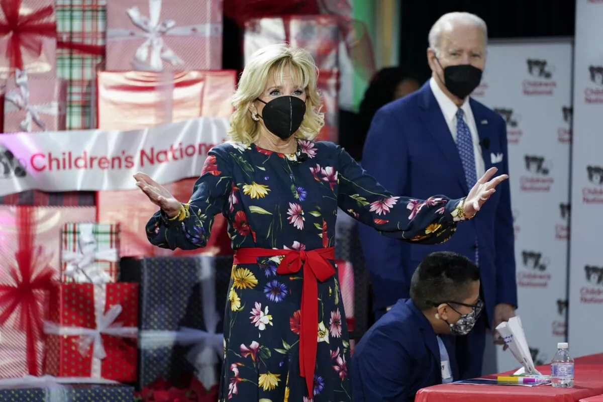 President Joe Biden and First Lady Jill Biden greet patients at Children's National Hospital in Washington on Dec. 24, 2021. (Carolyn Kaster/AP Photo)