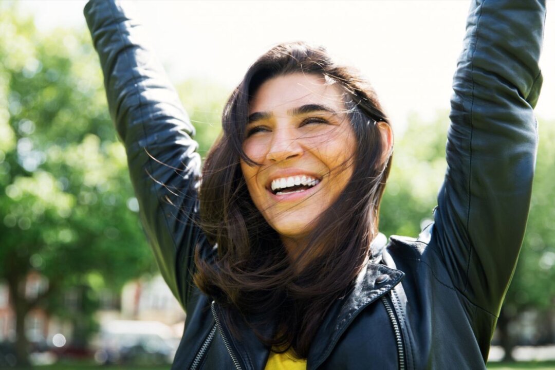 Stock photo of a person smiling. (Tim Robberts/Getty Images)