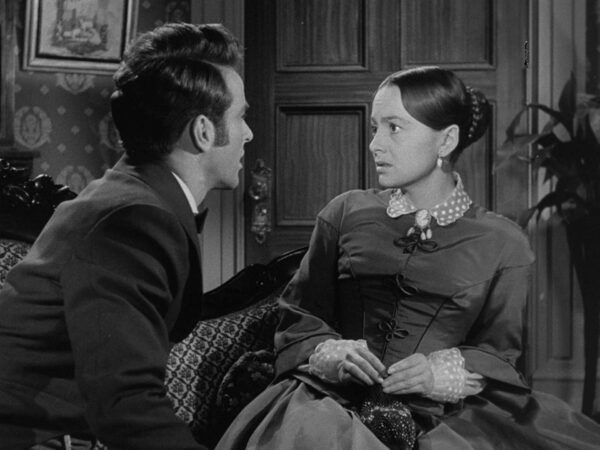 young man ardently pursues a woman