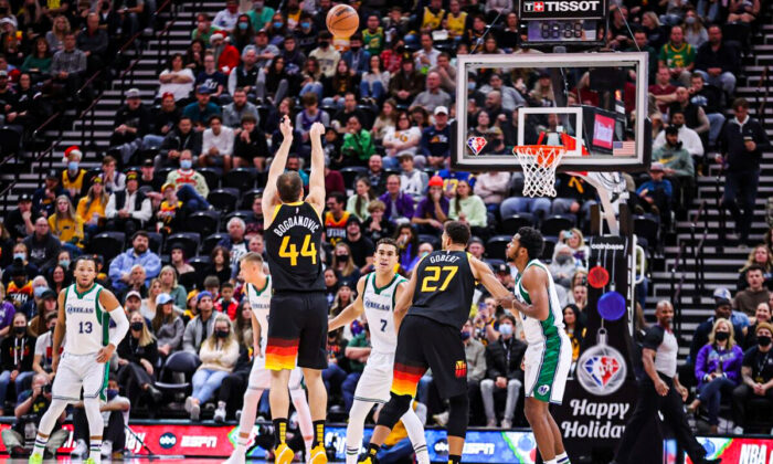 Utah Jazz forward Bojan Bogdanovic (44) makes a three point basket in the first quarter against the Dallas Mavericks at Vivint Arena in Salt Lake City, on Dec. 25, 2021. (Rob Gray/USA TODAY Sports via Field Level Media)