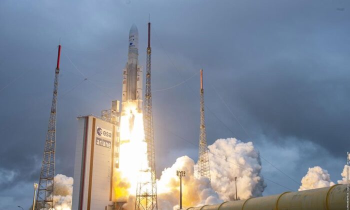 Arianespace’s Ariane 5 rocket with NASA’s James Webb Space Telescope onboard, lifts off at Europe’s Spaceport, the Guiana Space Center in Kourou, French Guiana, on Dec. 25, 2021.
(Jm Guillon/The Associated Press)