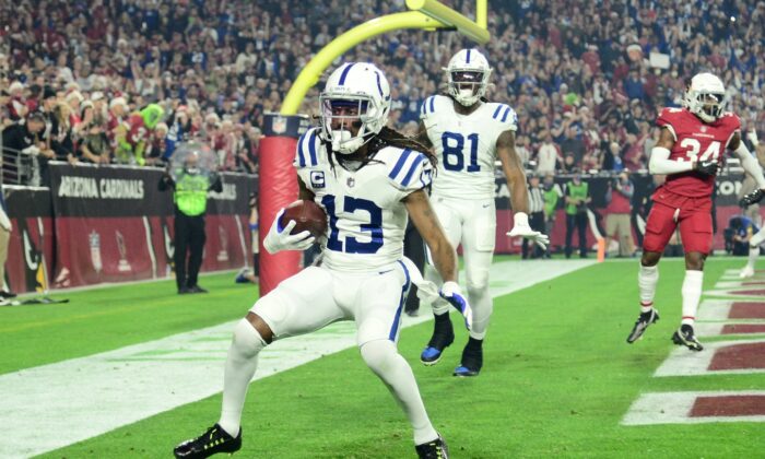 Indianapolis Colts wide receiver T.Y. Hilton (13) makes a touchdown catch against the Arizona Cardinals during the first half at State Farm Stadium in Glendale, Arizona, USA; Dec 25, 2021;  (Mandatory Credit: Joe Camporeale-USA TODAY Sports)