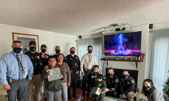 Huntington Beach Police Department Plays Santa for Underprivileged Family