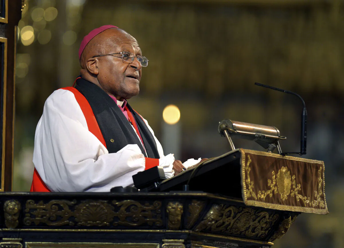 South African Archbishop Emeritus Desmond Tutu makes an address at Westminster Abbey in London during the memorial service for the former South African President Nelson Mandela, on March 3, 2014. (John Stillwell/Pool Photo via AP)