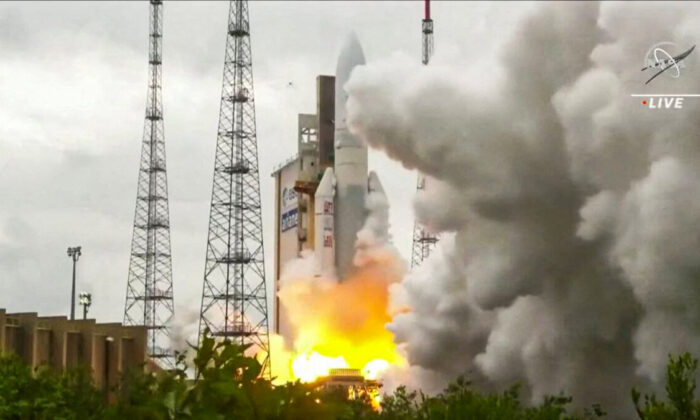 Arianespace's Ariane 5 rocket, with NASA's James Webb Space Telescope onboard, launches from Europe's Spaceport, the Guiana Space Center in Kourou, French Guiana, on Dec. 25, 2021, in a still image from video. (NASA/NASA TV/Handout via Reuters)
