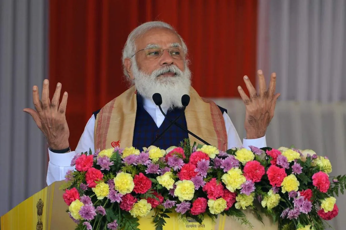 Indian Prime Minister Narendra Modi gestures as he addresses a public meeting at Jerenga Pathar in Sivasagar district of India's Assam state on Jan. 23, 2021. (Biju Borg/AFP via Getty Images)