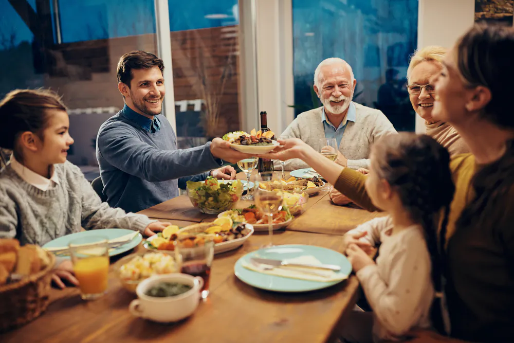 Making a priority of having meals together sends the message that family matters. (Drazen Zigic/Shutterstock)