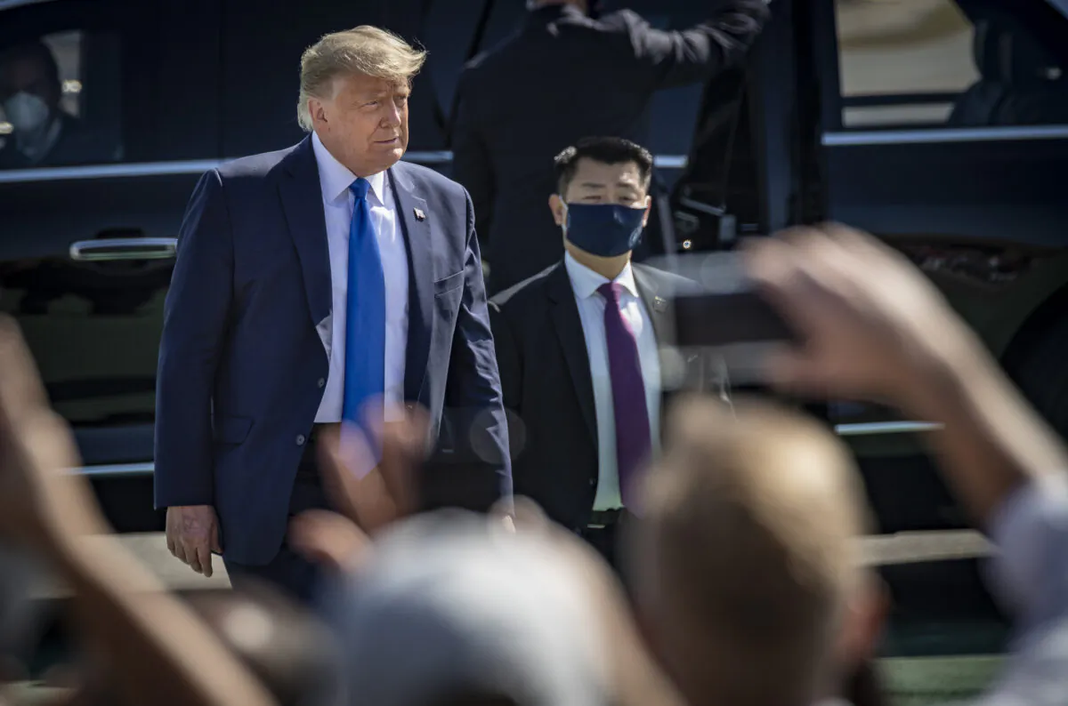 Then President Donald Trump exits Air Force One to a crowd of supporters in Santa Ana, Calif., on Oct. 18, 2020. (John Fredricks/The Epoch Times)