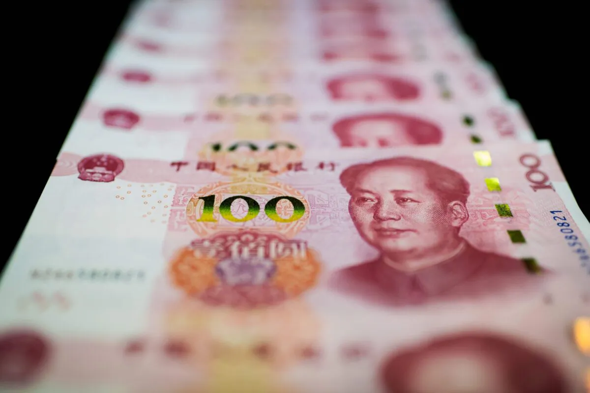 This photo illustration shows Chinese 100 yuan notes in Beijing on Jan. 14, 2020. (Nicolas Asfouri/AFP via Getty Images)
