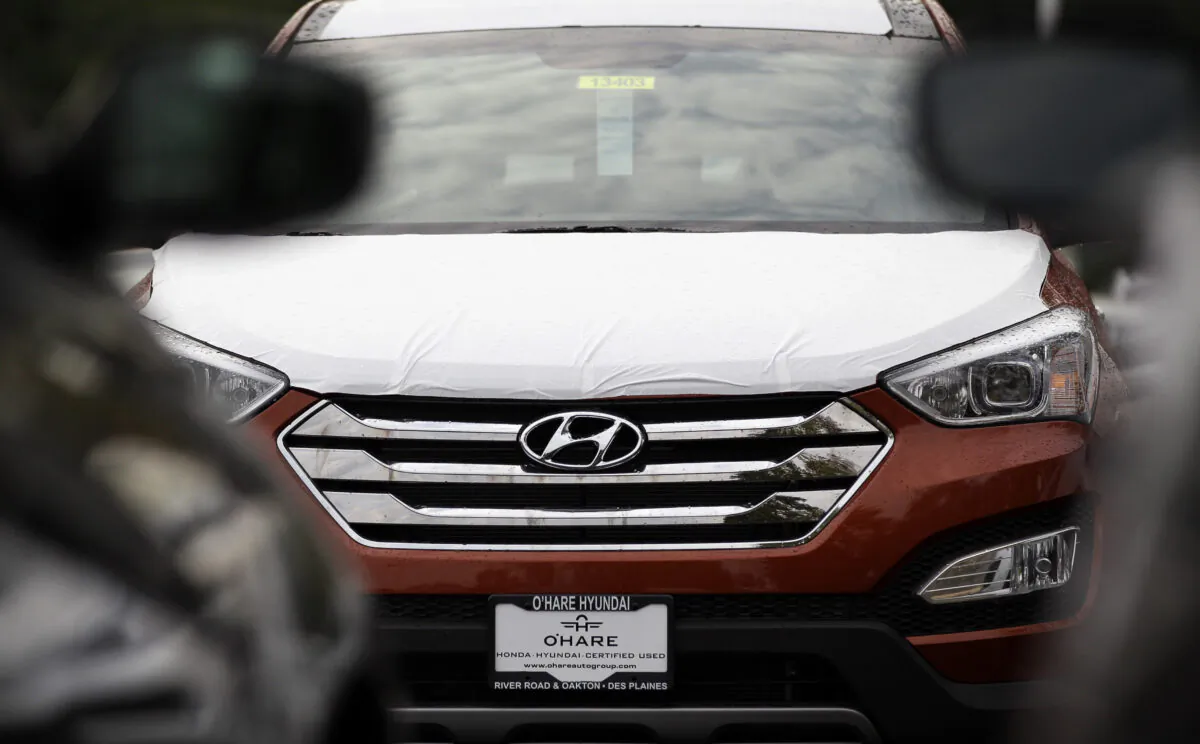 A Hyundai Sonata sits in a Hyundai car dealership in Des Plaines, Ill., on Oct. 4, 2012. (Nam Y. Huh/AP Photo)