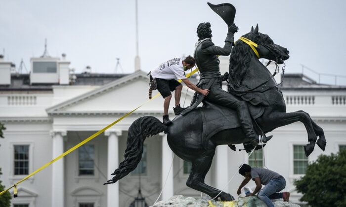 Protesters attempt to pull down the statue of Andrew Jackson in Lafayette Square near the White House in Washington on June 22, 2020. (Drew Angerer/Getty Images)
