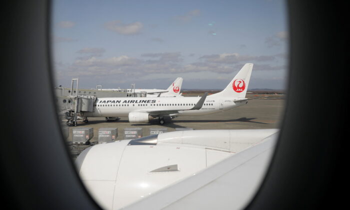 Japan Airlines (JAL) planes will land on May 4, 2021 at the tarmac of New Chitose Airport in Sapporo, Hokkaido.  (Issei Kato / Reuters)