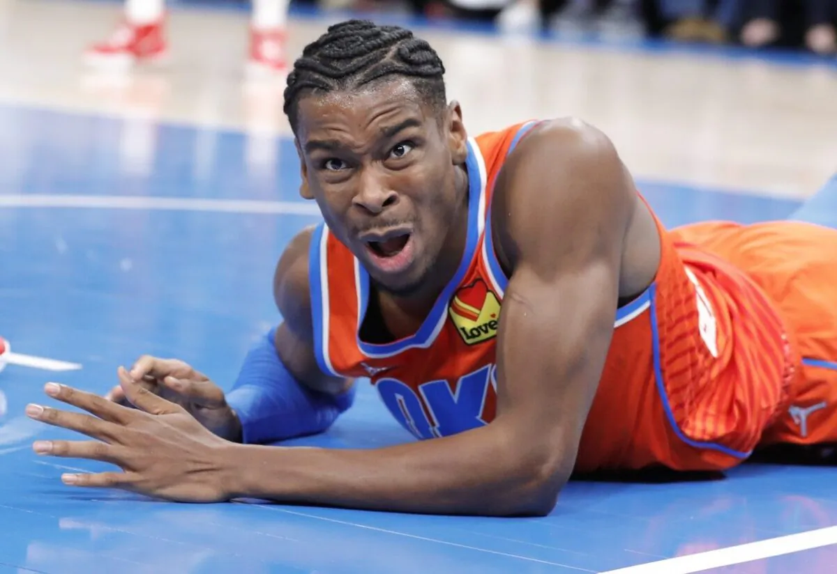 Oklahoma City Thunder guard Shai Gilgeous-Alexander (2) reacts after getting fouled by New Orleans Pelicans guard Devonte' Graham (4), during an NBA game at Paycom Center, in Oklahoma City, Okla., on Dec. 26, 2021. (Alonzo Adams/USA TODAY Sports via Field Level Media)