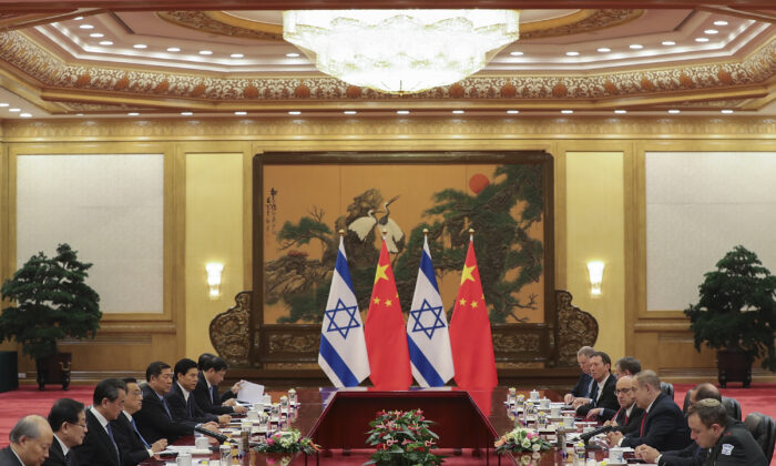 Chinese Premier Li Keqiang (4nd-L) meets with Israel Prime Minister Benjamin Netanyahu (3nd-R) at the Great Hall of the People on in Beijing, China, on March 20, 2017. (Lintao Zhang/Pool/Getty Images)