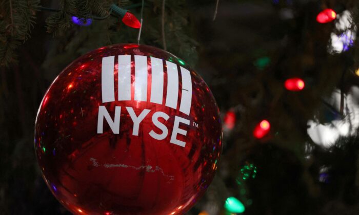A decoration hangs on a Christmas tree outside the New York Stock Exchange (NYSE) on the last day of trading before Christmas in Manhattan, New York City, on Dec. 23, 2021. (Andrew Kelly/Reuters)