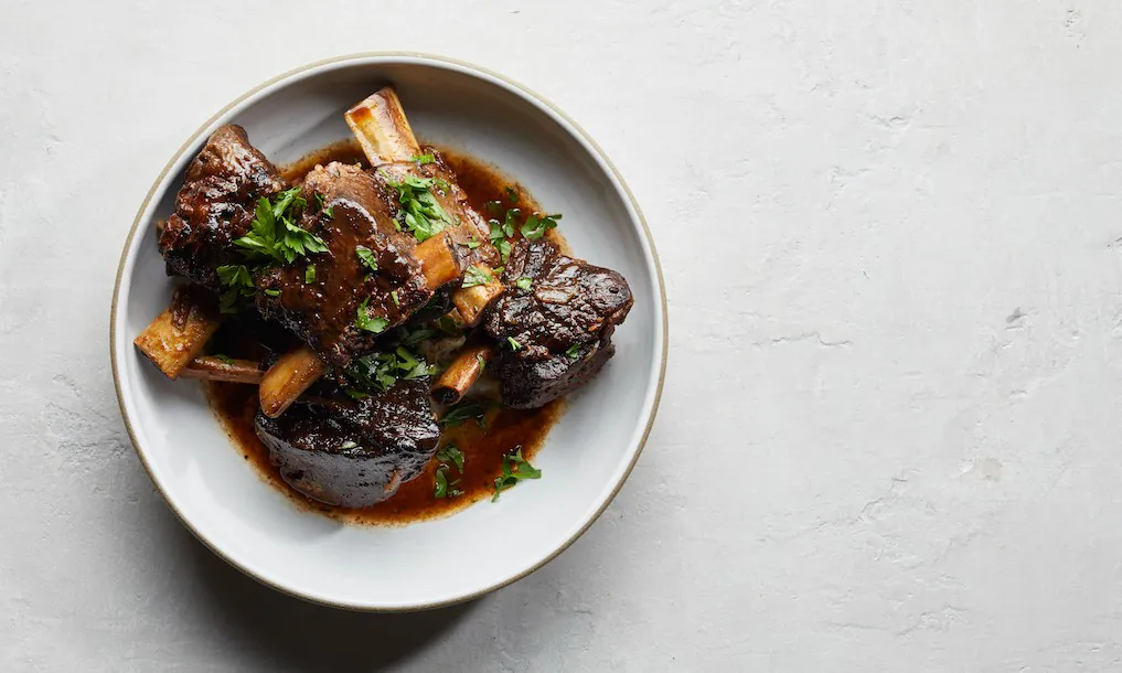 These short ribs are slow-cooked until meltingly tender. (Jacob Fox/TNS)