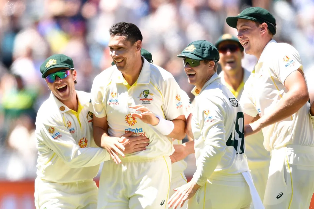 Scott Boland of Australia (2nd left) celebrates with teammates after dismissing Ollie Robinson of England during day 3 of the third Ashes Test between Australia and England at the MCG in Melbourne, Australia, on Dec. 28, 2021. (AAP Image/James Ross) 