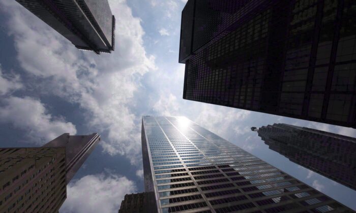 Bank towers on Bay Street in Toronto’s financial district, in a file photo. Governmental and financial systems’ vulnerability to cyberattacks has led to calls for coordinated international efforts to fortify cybersecurity defences. (The Canadian Press/Adrien Veczan)