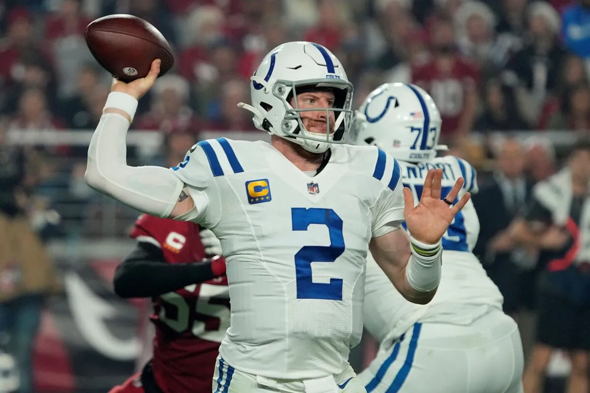 Indianapolis Colts quarterback Carson Wentz (2) throws against the Arizona Cardinals during the second half of an NFL football game in Glendale, Ariz, on Dec. 25, 2021. (Rick Scuteri/AP Photo)