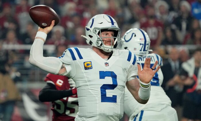Indianapolis Colts quarterback Carson Wentz (2) throws against the Arizona Cardinals during the second half of an NFL football game in Glendale, Ariz, on Dec. 25, 2021. (Rick Scuteri/AP Photo)