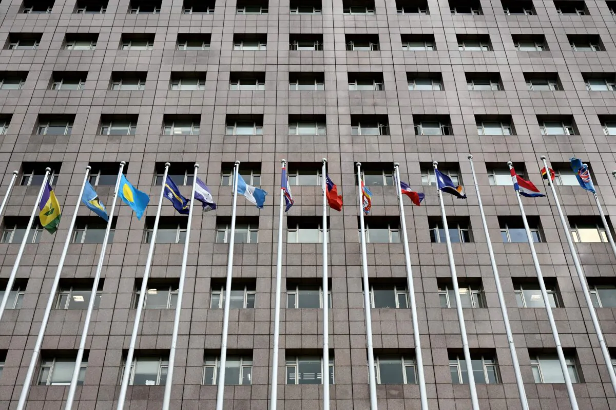Flags fly outside the Diplomatic Quarter, a building in Taipei that houses most nations still retaining diplomatic ties with Taiwan, on Dec. 10, 2021. (Sam Yeh/AFP via Getty Images)
