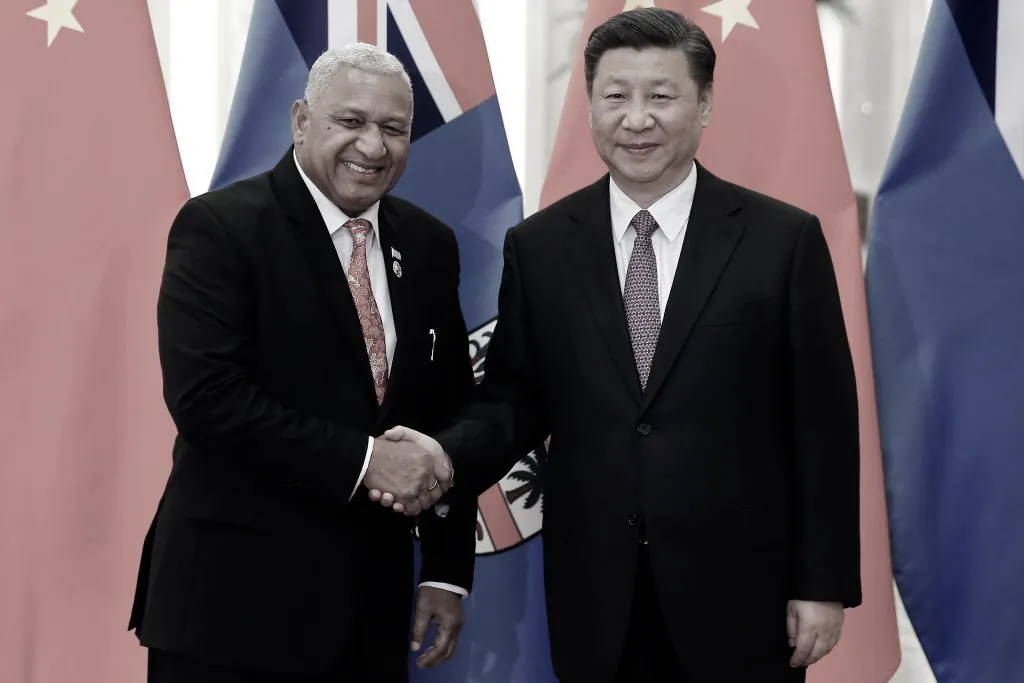 Fiji's Prime Minister Josaia Voreqe Bainimarama shakes hands with Chinese President Xi Jinping as they meet at the Great Hall of the People in Beijing, China, on May 16, 2017. (Damir Sagolj-Pool/Getty Images)