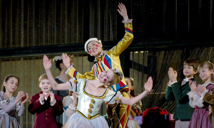 The New York City Ballet performs an excerpt from "The Nutcracker", as part of the tree lighting ceremony at Lincoln Center in New York, on Nov. 28, 2005. (Henny Ray Abrams/AP Photo)