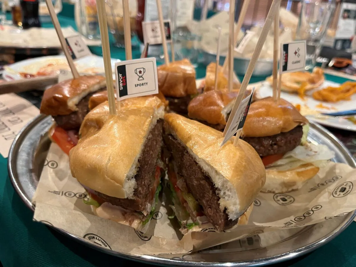 A plant-based hamburger, cooked by a robot developed by Israeli food-tech company SavorEat is served at a restaurant in Herzliya, Israel, on Dec. 28, 2021. (Steven Scheer/Reuters)