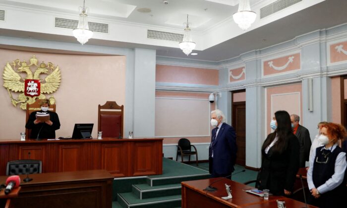 A judge of the Russian Supreme Court delivers the verdict during a hearing to consider the closure of the human rights group International Memorial in Moscow, Russia, on Dec. 28, 2021. (Evgenia Novozhenina)