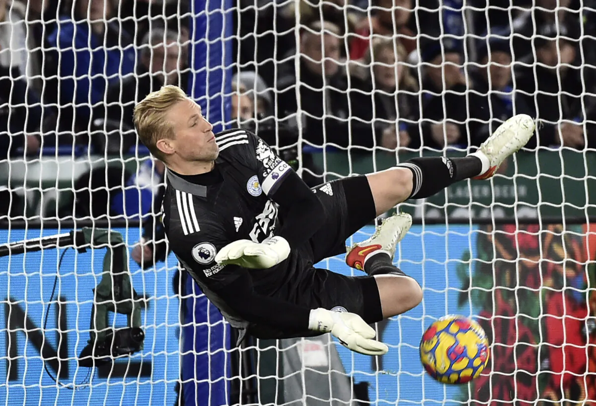 Leicester's goalkeeper Kasper Schmeichel makes a save penalty in front of Liverpool's Mohamed Salah during the English Premier League soccer match between Leicester City and Liverpool at the King Power Stadium in Leicester, England, on Dec. 28, 2021. (Rui Vieira/AP Photo)