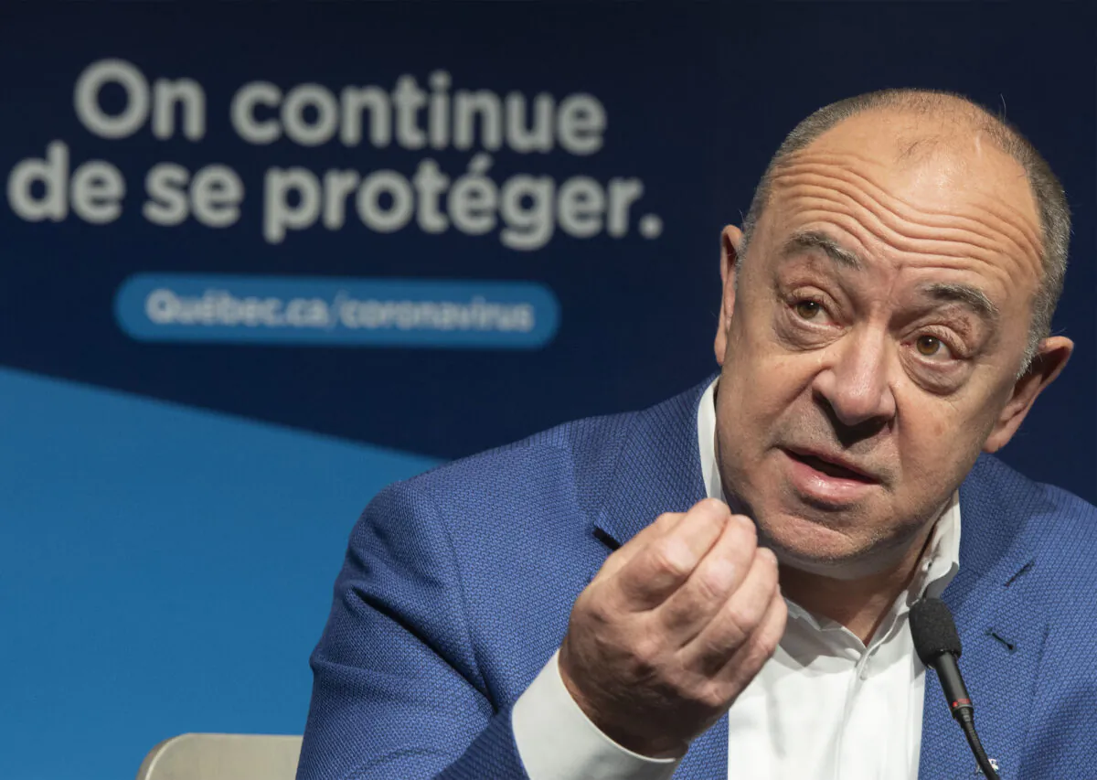 Quebec Health Minister Christian Dube speaks during a news conference where he gave an update on the ongoing COVID-19 pandemic in Montreal on Dec. 28, 2021. (Graham Hughes/The Canadian Press)